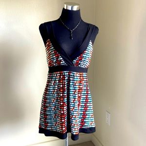 Sleeveless  top- amazing mix of colors w mid modern century graphic patterns